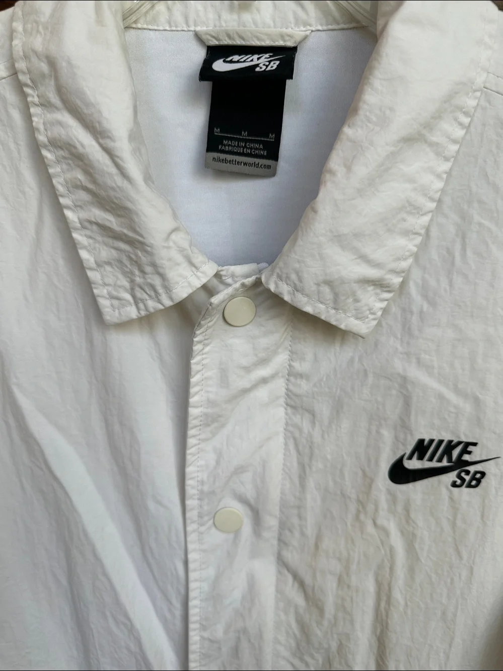 Nike SB White Coach Windbreaker Jacket with Drawstring Hem & Full Lining Size M